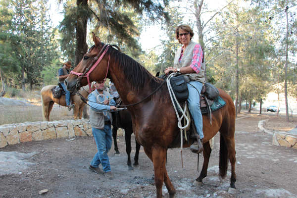 Dina and her horse. Photograph: Yoav Dvir Dina and her horse. Photograph: Yoav Dvir