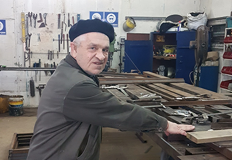 Tzvi Hersch at his job in the metalworking shop in the Biriya Forest. Photo: Mira Zar Tzvi Hersch at his job in the metalworking shop in the Biriya Forest. Photo: Mira Zar