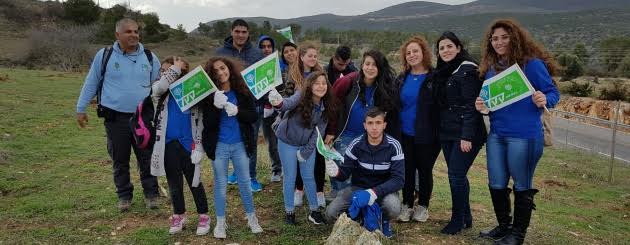 נטיעת עצים משותפת בהר כנען. צילום: רים דגש קקל