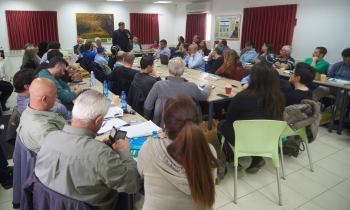 יור קקל, דני עטר, נושא דברים בכנס. צילום: יעל הרמן
