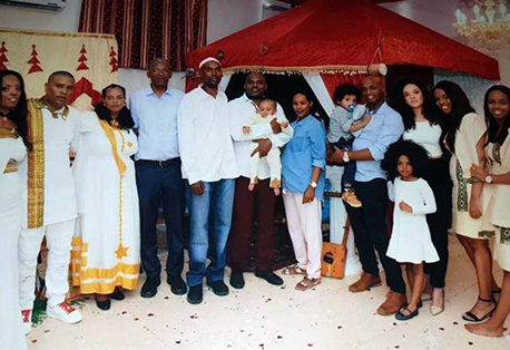 Avi Kasahun (fourth on the left) and his family. Photograph courtesy of the family. Avi Kasahun (fourth on the left) and his family. Photograph courtesy of the family.